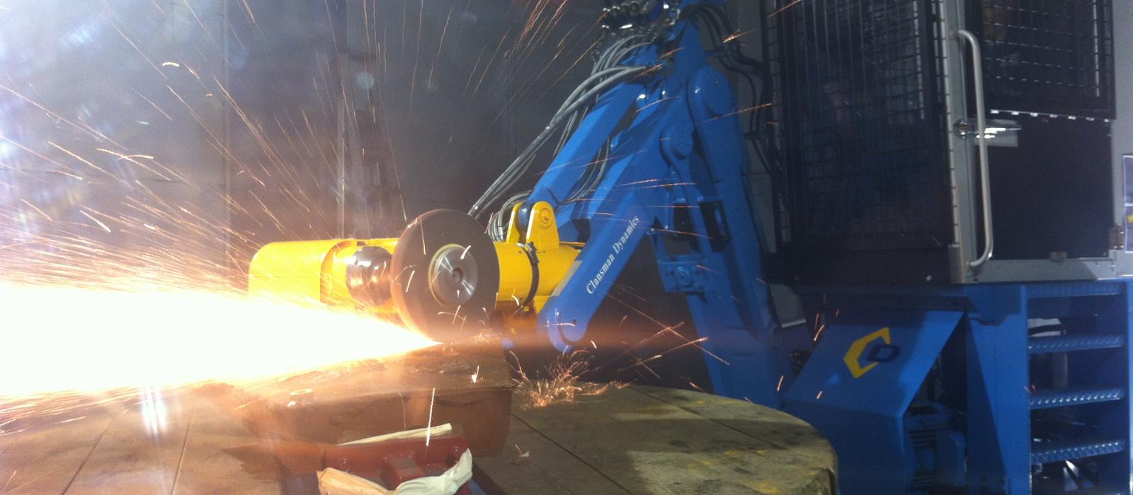 Clansman operator grinding material